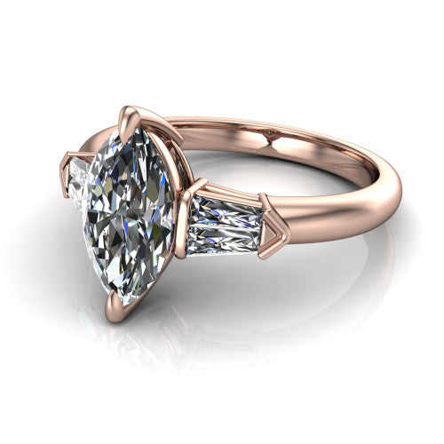 Gracie marquise three stone engagement ring in 18K Rose Gold, three-quarter perspective showing the marquise center diamond between tapered baguette side stones