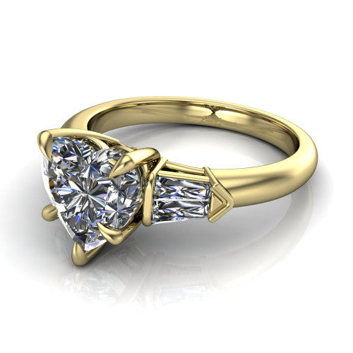 Gracie heart three stone engagement ring in 14K Yellow Gold, three-quarter perspective showing the heart center diamond between tapered baguette side stones