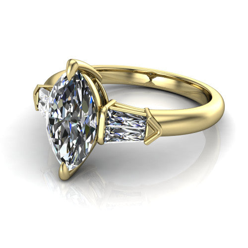 Gracie marquise three stone engagement ring in 14K Yellow Gold, three-quarter perspective showing the marquise center diamond between tapered baguette side stones