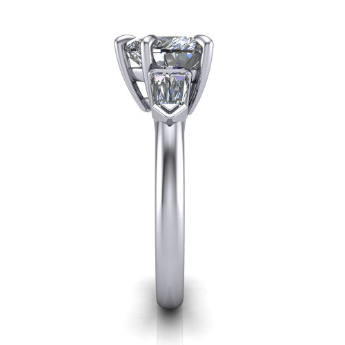Gracie heart three stone engagement ring in Platinum, side profile showing the baguette side stones and polished band