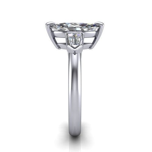 Gracie marquise three stone engagement ring in 18K White Gold, side profile showing the baguette side stones and polished band