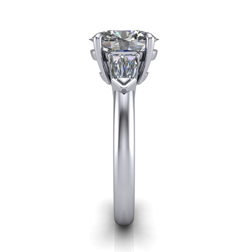 Gracie oval three stone engagement ring in Platinum, side profile showing the baguette side stones and polished band