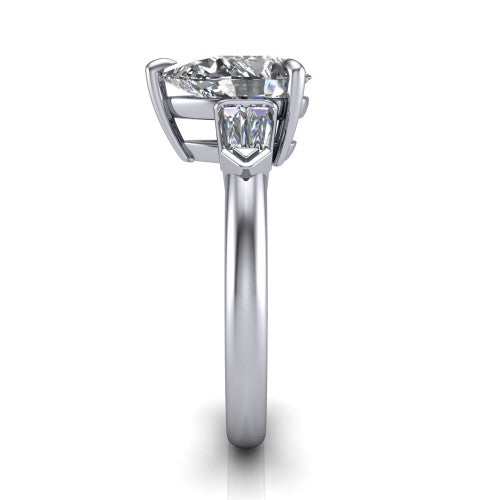 Gracie pear three stone engagement ring in Platinum, side profile showing the baguette side stones and polished band
