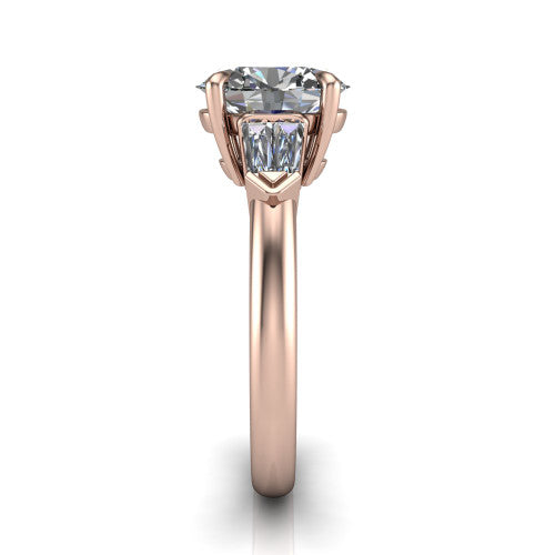 Gracie oval three stone engagement ring in 14K Rose Gold, side profile showing the baguette side stones and polished band