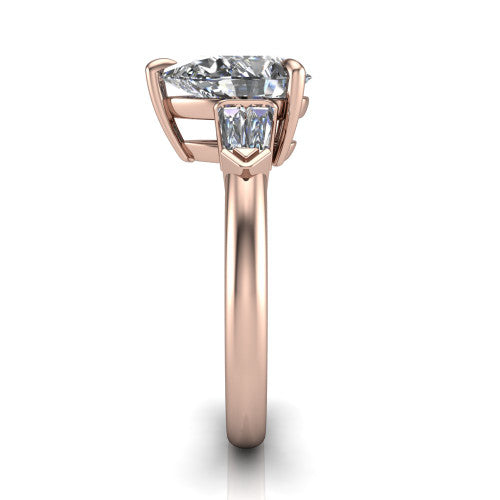 Gracie pear three stone engagement ring in 18K Rose Gold, side profile showing the baguette side stones and polished band