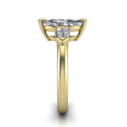 Gracie marquise three stone engagement ring in 14K Yellow Gold, side profile showing the baguette side stones and polished band