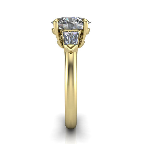 Gracie oval three stone engagement ring in 18K Yellow Gold, side profile showing the baguette side stones and polished band