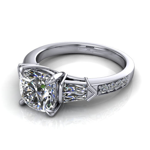 Audrey cushion three stone engagement ring in Platinum, three-quarter perspective showing the center diamond between two tapered baguette side stones above a pav&eacute; band