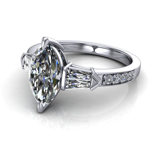 Audrey marquise three stone engagement ring in 18K White Gold, three-quarter perspective showing the center diamond between two tapered baguette side stones above a pav&eacute; band