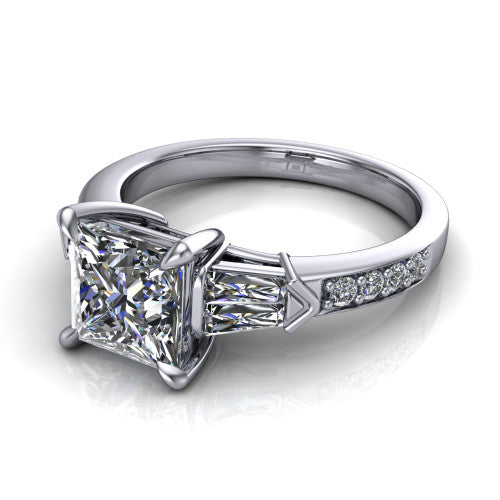 Audrey princess three stone engagement ring in 18K White Gold, three-quarter perspective showing the center diamond between two tapered baguette side stones above a pav&eacute; band