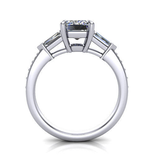 Audrey emerald three stone engagement ring in 18K White Gold, through-finger front profile showing the three-stone head raised above the pav&eacute; band