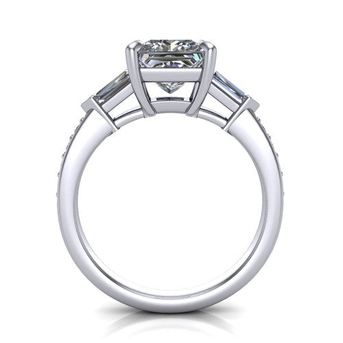 Audrey princess three stone engagement ring in 18K White Gold, through-finger front profile showing the three-stone head raised above the pav&eacute; band