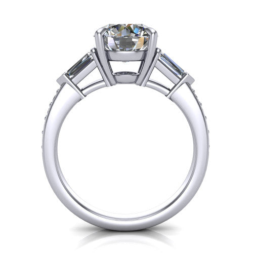 Audrey round three stone engagement ring in Platinum, through-finger front profile showing the three-stone head raised above the pav&eacute; band