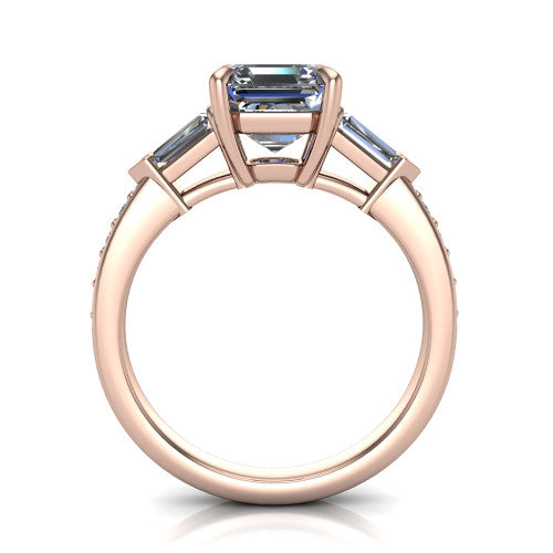 Audrey asscher three stone engagement ring in 14K Rose Gold, through-finger front profile showing the three-stone head raised above the pav&eacute; band