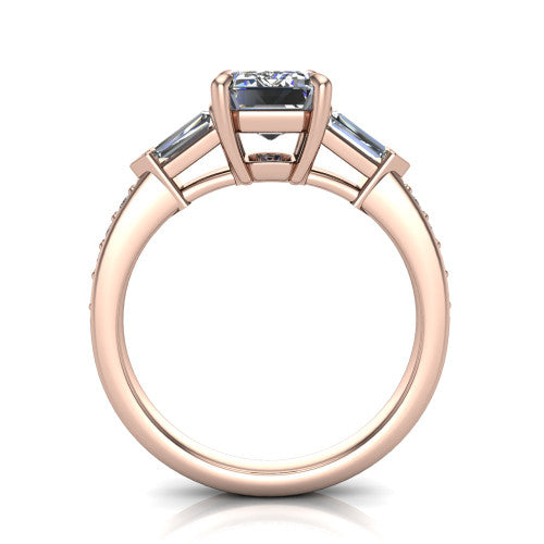 Audrey emerald three stone engagement ring in 18K Rose Gold, through-finger front profile showing the three-stone head raised above the pav&eacute; band