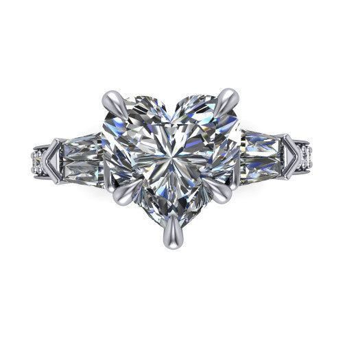 Audrey heart three stone engagement ring in 18K White Gold, top-down view showing the center diamond flanked by two tapered baguette side stones over a diamond-set shank