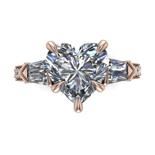Audrey heart three stone engagement ring in 14K Rose Gold, top-down view showing the center diamond flanked by two tapered baguette side stones over a diamond-set shank