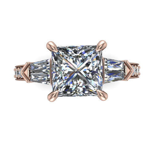 Audrey princess three stone engagement ring in 14K Rose Gold, top-down view showing the center diamond flanked by two tapered baguette side stones over a diamond-set shank