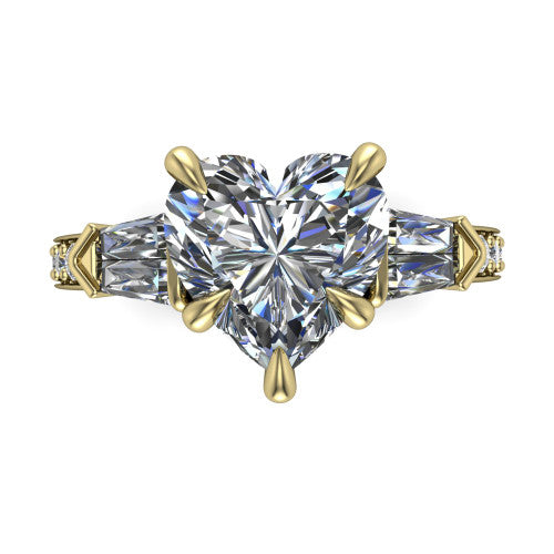 Audrey heart three stone engagement ring in 14K Yellow Gold, top-down view showing the center diamond flanked by two tapered baguette side stones over a diamond-set shank