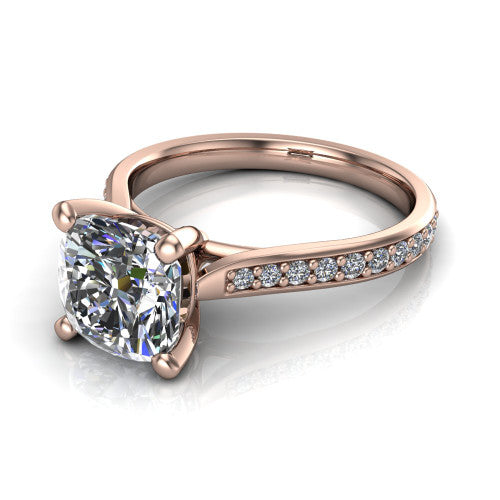 Ruby cushion classic engagement ring in 14K Rose Gold, three-quarter perspective showing the solitaire center diamond raised above a pav&eacute; shank