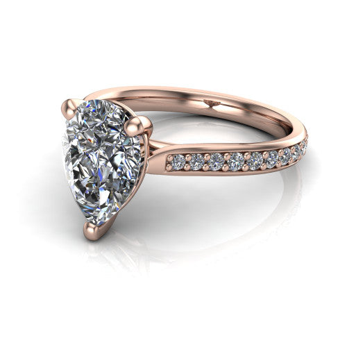Ruby pear classic engagement ring in 18K Rose Gold, three-quarter perspective showing the solitaire center diamond raised above a pav&eacute; shank