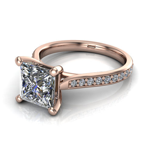 Ruby princess classic engagement ring in 14K Rose Gold, three-quarter perspective showing the solitaire center diamond raised above a pav&eacute; shank