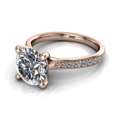 Ruby round classic engagement ring in 18K Rose Gold, three-quarter perspective showing the solitaire center diamond raised above a pav&eacute; shank