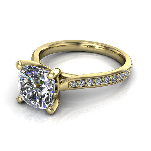 Ruby cushion classic engagement ring in 18K Yellow Gold, three-quarter perspective showing the solitaire center diamond raised above a pav&eacute; shank