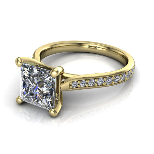 Ruby princess classic engagement ring in 14K Yellow Gold, three-quarter perspective showing the solitaire center diamond raised above a pav&eacute; shank