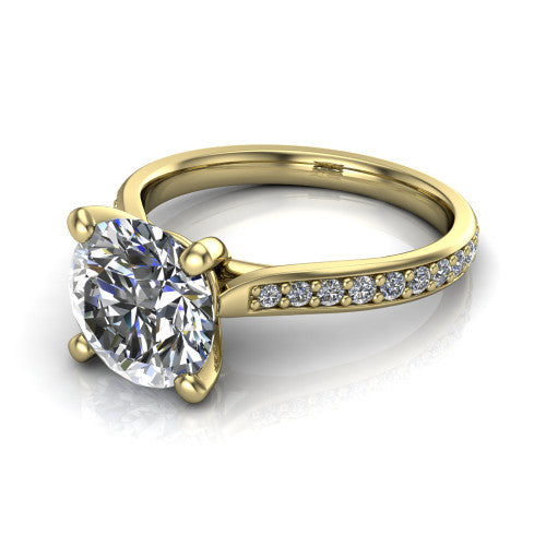 Ruby round classic engagement ring in 18K Yellow Gold, three-quarter perspective showing the solitaire center diamond raised above a pav&eacute; shank
