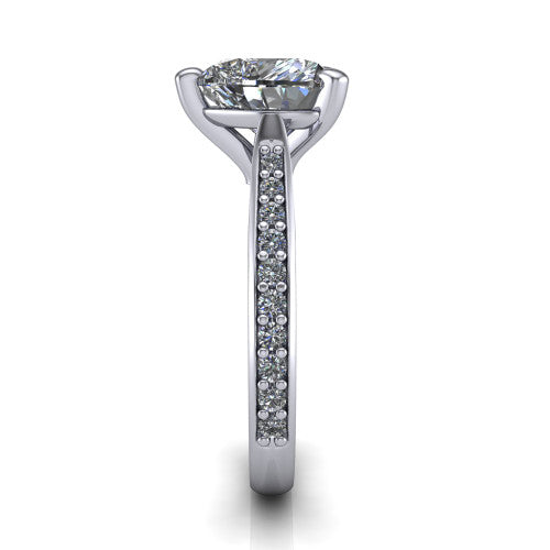 Ruby heart classic engagement ring in 18K White Gold, side profile showing the cathedral shoulders and the round diamonds running down the shank