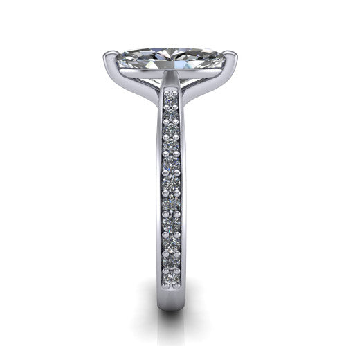 Ruby marquise classic engagement ring in Platinum, side profile showing the cathedral shoulders and the round diamonds running down the shank