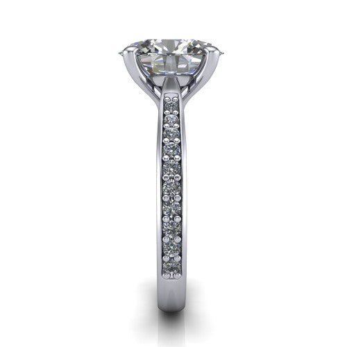 Ruby oval classic engagement ring in 18K White Gold, side profile showing the cathedral shoulders and the round diamonds running down the shank