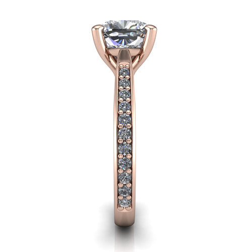 Ruby cushion classic engagement ring in 18K Rose Gold, side profile showing the cathedral shoulders and the round diamonds running down the shank
