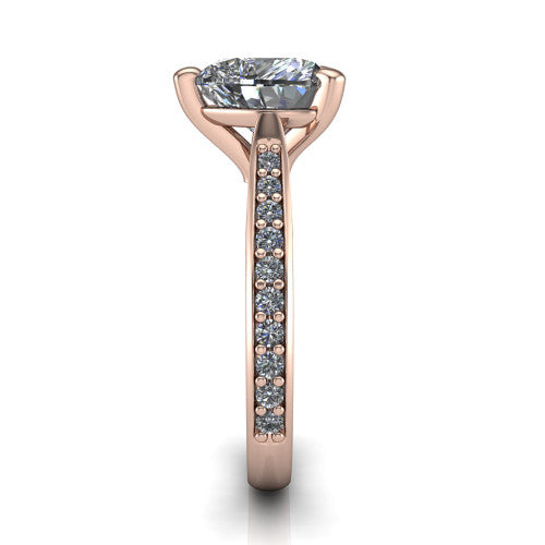 Ruby heart classic engagement ring in 18K Rose Gold, side profile showing the cathedral shoulders and the round diamonds running down the shank