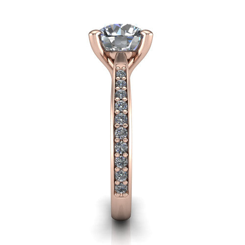 Ruby round classic engagement ring in 18K Rose Gold, side profile showing the cathedral shoulders and the round diamonds running down the shank
