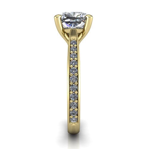 Ruby cushion classic engagement ring in 14K Yellow Gold, side profile showing the cathedral shoulders and the round diamonds running down the shank