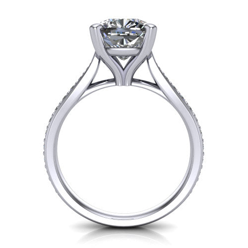 Ruby cushion classic engagement ring in 14K White Gold, through-finger front profile showing the solitaire head raised above the pav&eacute; band and trellis gallery