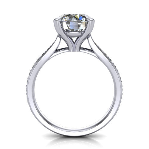Ruby round classic engagement ring in 14K White Gold, through-finger front profile showing the solitaire head raised above the pav&eacute; band and trellis gallery