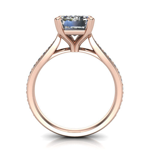 Ruby emerald classic engagement ring in 18K Rose Gold, through-finger front profile showing the solitaire head raised above the pav&eacute; band and trellis gallery
