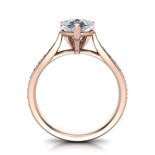 Ruby pear classic engagement ring in 18K Rose Gold, through-finger front profile showing the solitaire head raised above the pav&eacute; band and trellis gallery