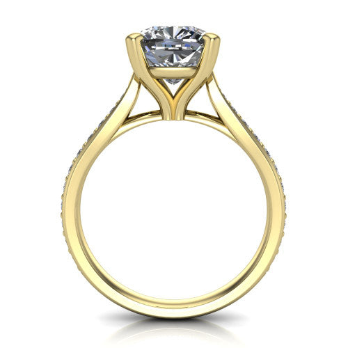Ruby cushion classic engagement ring in 14K Yellow Gold, through-finger front profile showing the solitaire head raised above the pav&eacute; band and trellis gallery