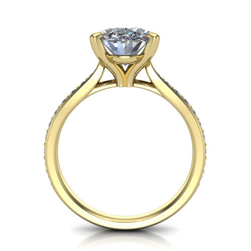 Ruby oval classic engagement ring in 14K Yellow Gold, through-finger front profile showing the solitaire head raised above the pav&eacute; band and trellis gallery