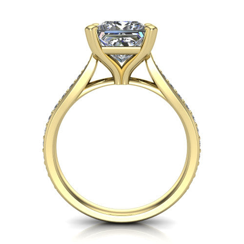 Ruby princess classic engagement ring in 18K Yellow Gold, through-finger front profile showing the solitaire head raised above the pav&eacute; band and trellis gallery
