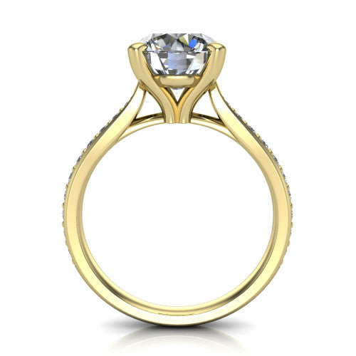 Ruby round classic engagement ring in 18K Yellow Gold, through-finger front profile showing the solitaire head raised above the pav&eacute; band and trellis gallery