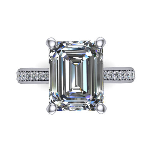 Ruby emerald classic engagement ring in Platinum, top-down view showing the prong-set center diamond over a diamond-set band