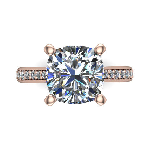 Ruby cushion classic engagement ring in 14K Rose Gold, top-down view showing the prong-set center diamond over a diamond-set band