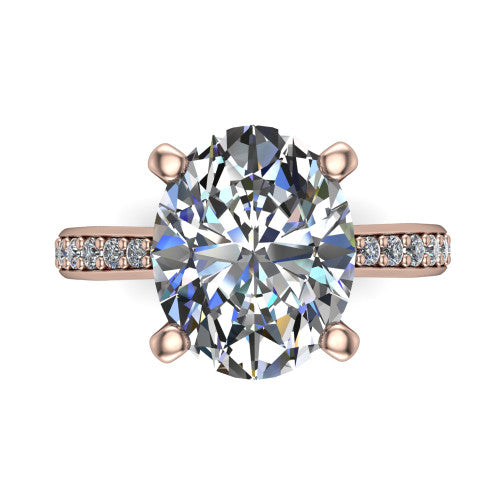 Ruby oval classic engagement ring in 18K Rose Gold, top-down view showing the prong-set center diamond over a diamond-set band