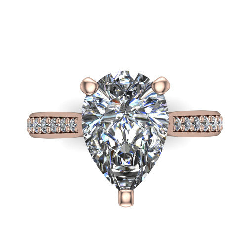 Ruby pear classic engagement ring in 18K Rose Gold, top-down view showing the prong-set center diamond over a diamond-set band