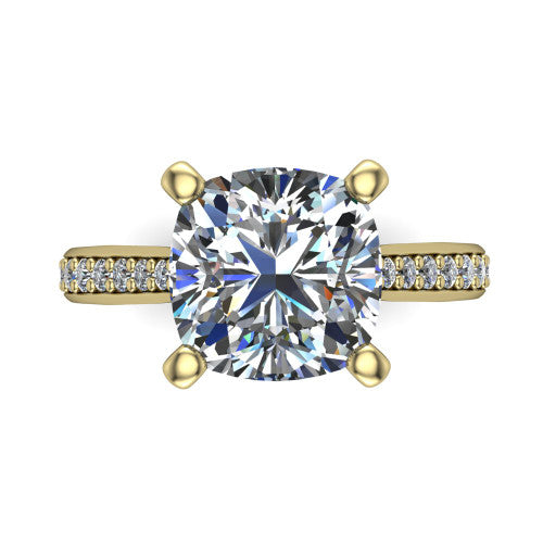 Ruby cushion classic engagement ring in 14K Yellow Gold, top-down view showing the prong-set center diamond over a diamond-set band